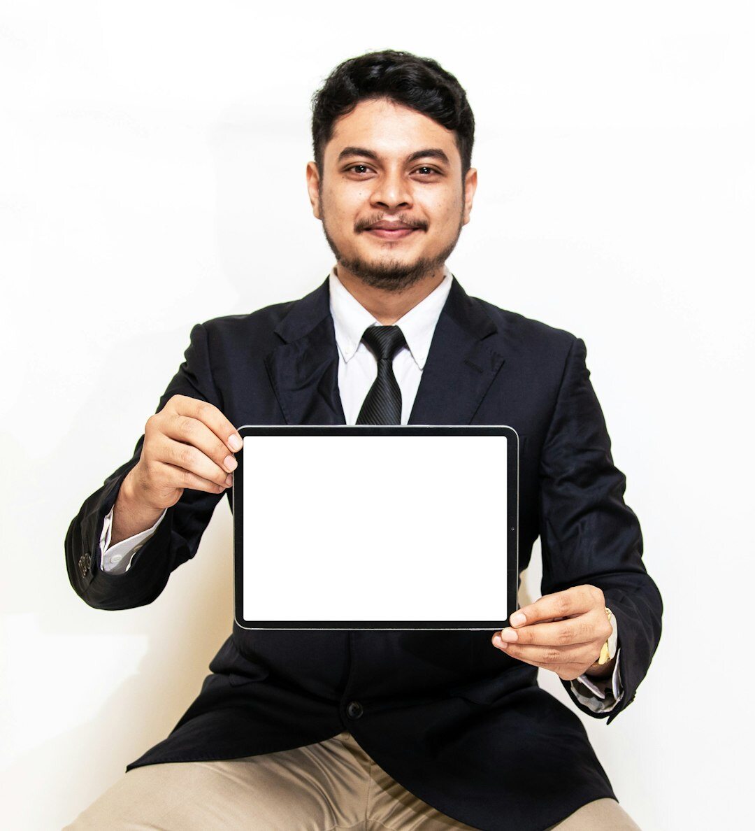 Studio portrait of an Argentine man in his forties, real estate advisor