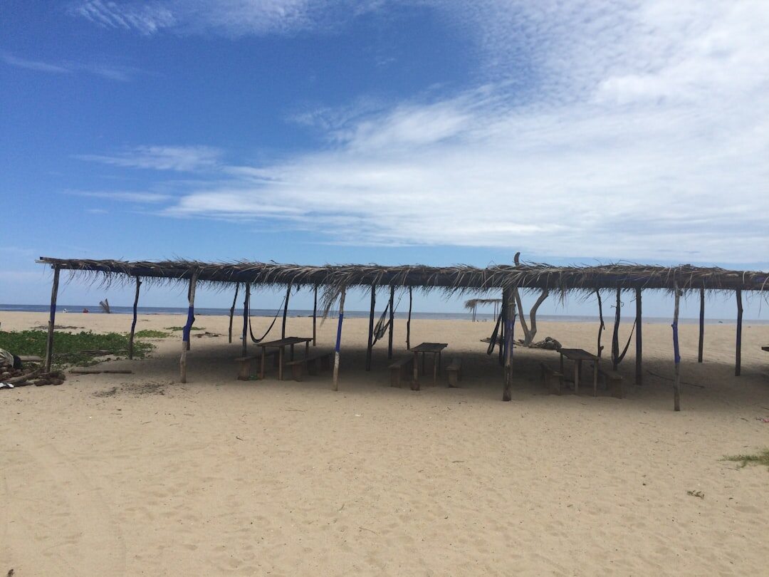 La Barra bridge over the river mouth with the beach and ocean in the background